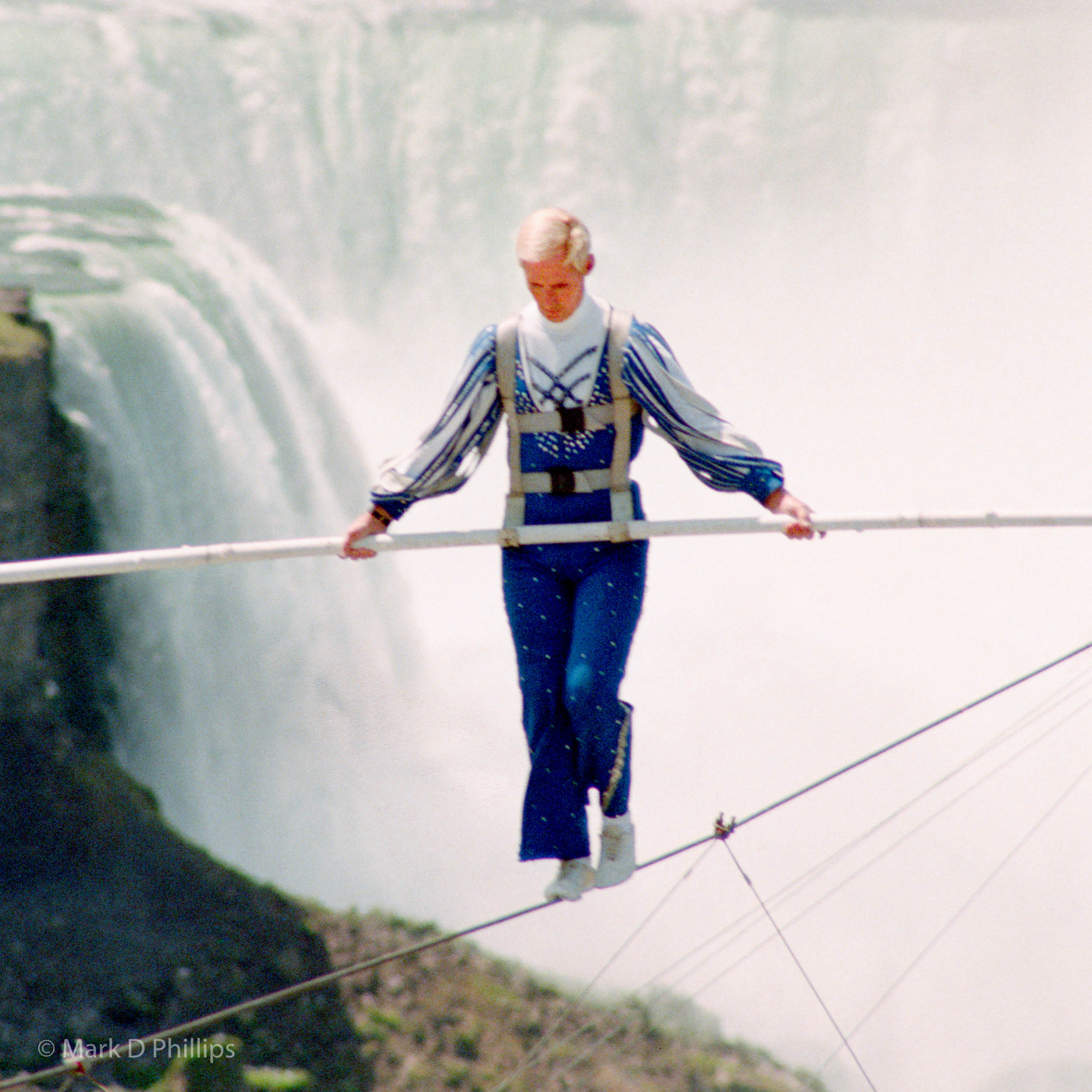 In 2002 Jay Cochrane completed the first skywalk in over a hundred years in Niagara Falls, Canada. The skywalk went from the pinnacle of the Sheraton on the Falls Hotel to the Casino Niagara Tower at a height of 40 stories, with Niagara Falls as the backdrop. "Skywalk at Niagara" was the highest skywalk ever completed in Niagara Falls. ©Mark D Phillips