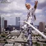 Jay Cochrane skywalks from the Ice Palace (175 feet tall) to the Marriott Waterside (450 feet tall) in Tampa, FL. Cochrane's 900-feet skywalk on a 5/8 inch cable on Wednesday, August 23, 2000, at noon. Cochrane holds five world records for skywalking but says that this walk was "a challenge." Photo by MARK D PHILLIPS